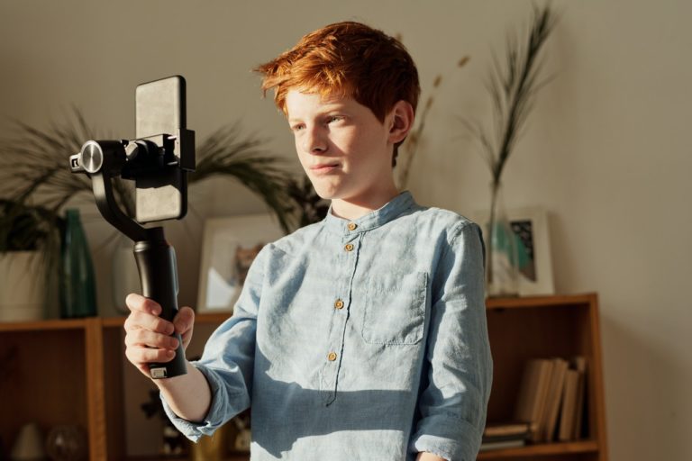boy recording with mobile phone