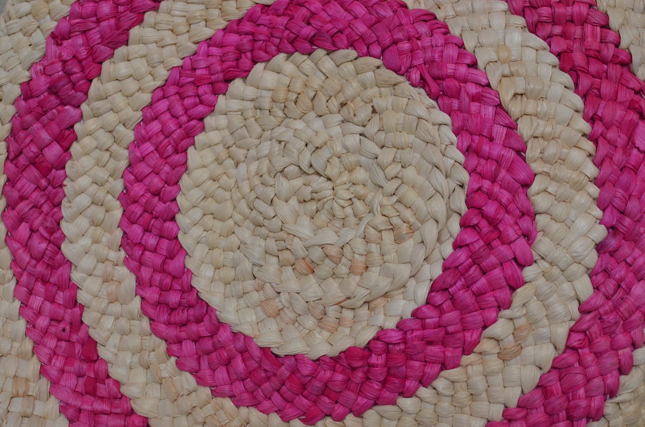 https://thespacewhale.com/wp-content/uploads/2023/11/Spiral-wicker-part-of-straw-carpet.jpg